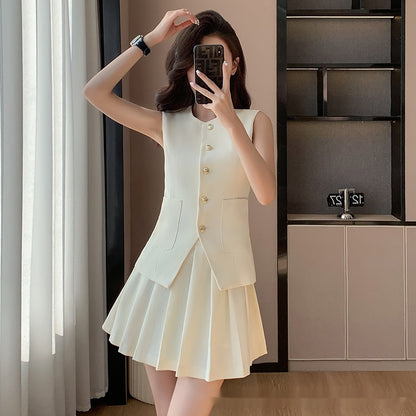 ENSEMBLE JUPE ET VESTE SANS MANCHE 